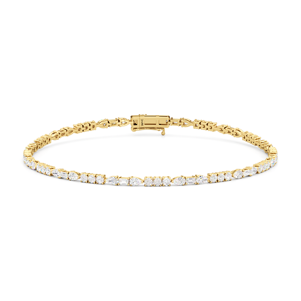 Pear, Emerald and Round Linear Tennis Bracelet with 2 3/4 Cut Diamond in 14KT Yellow Gold view 1
