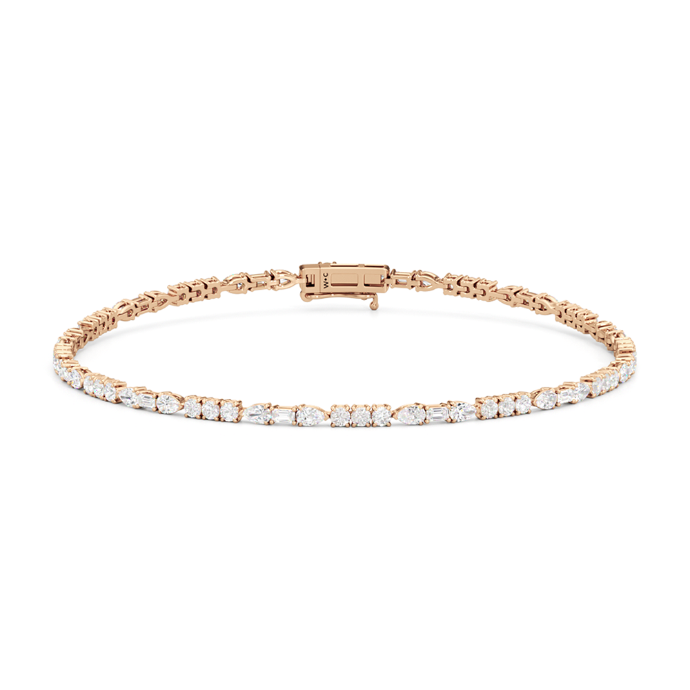 Pear, Emerald and Round Linear Tennis Bracelet with 2 3/4 Cut Diamond in 14KT Rose Gold view 1

