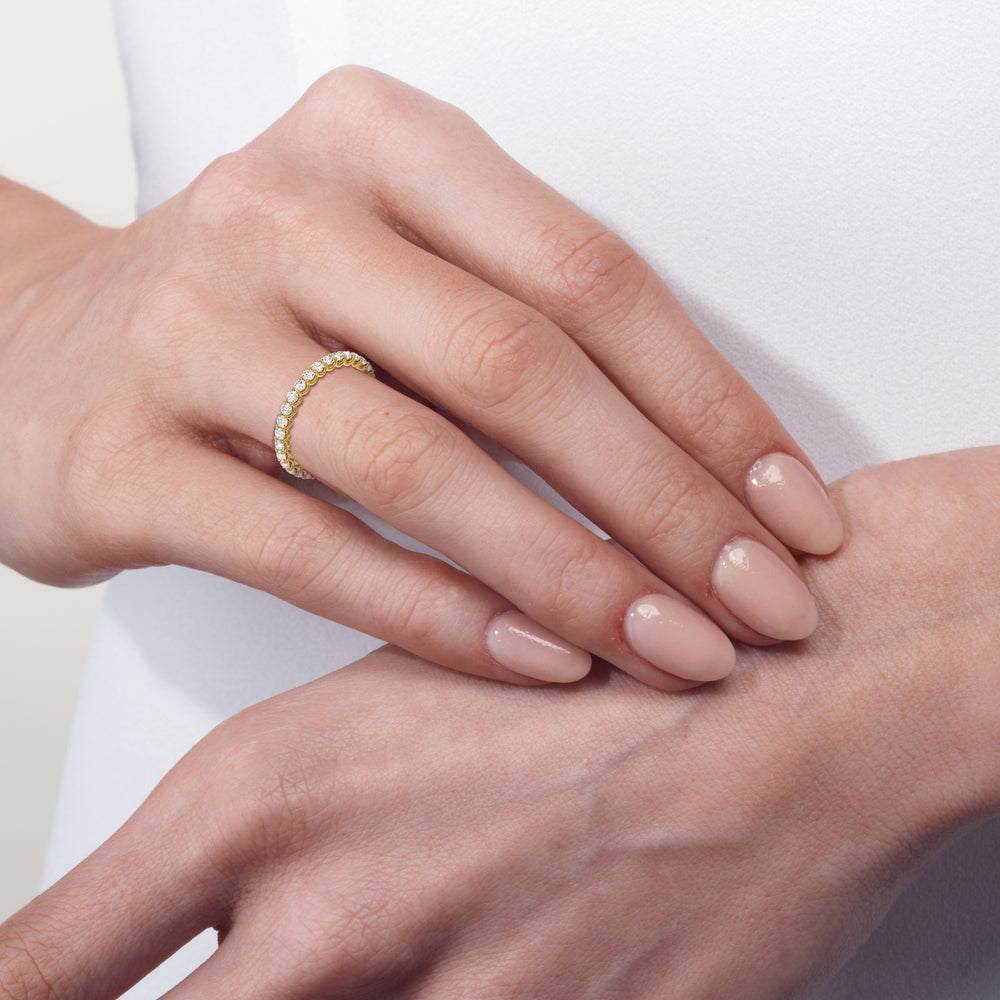 Model Wearing Shared Prong Wave Lab Diamond Eternity Ring view