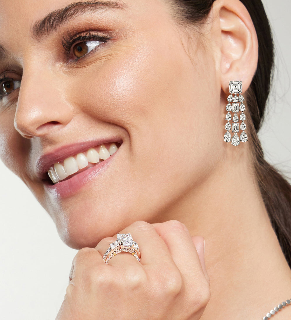 Model Wearing Pear and Emerald Shape Chandelier Earrings view