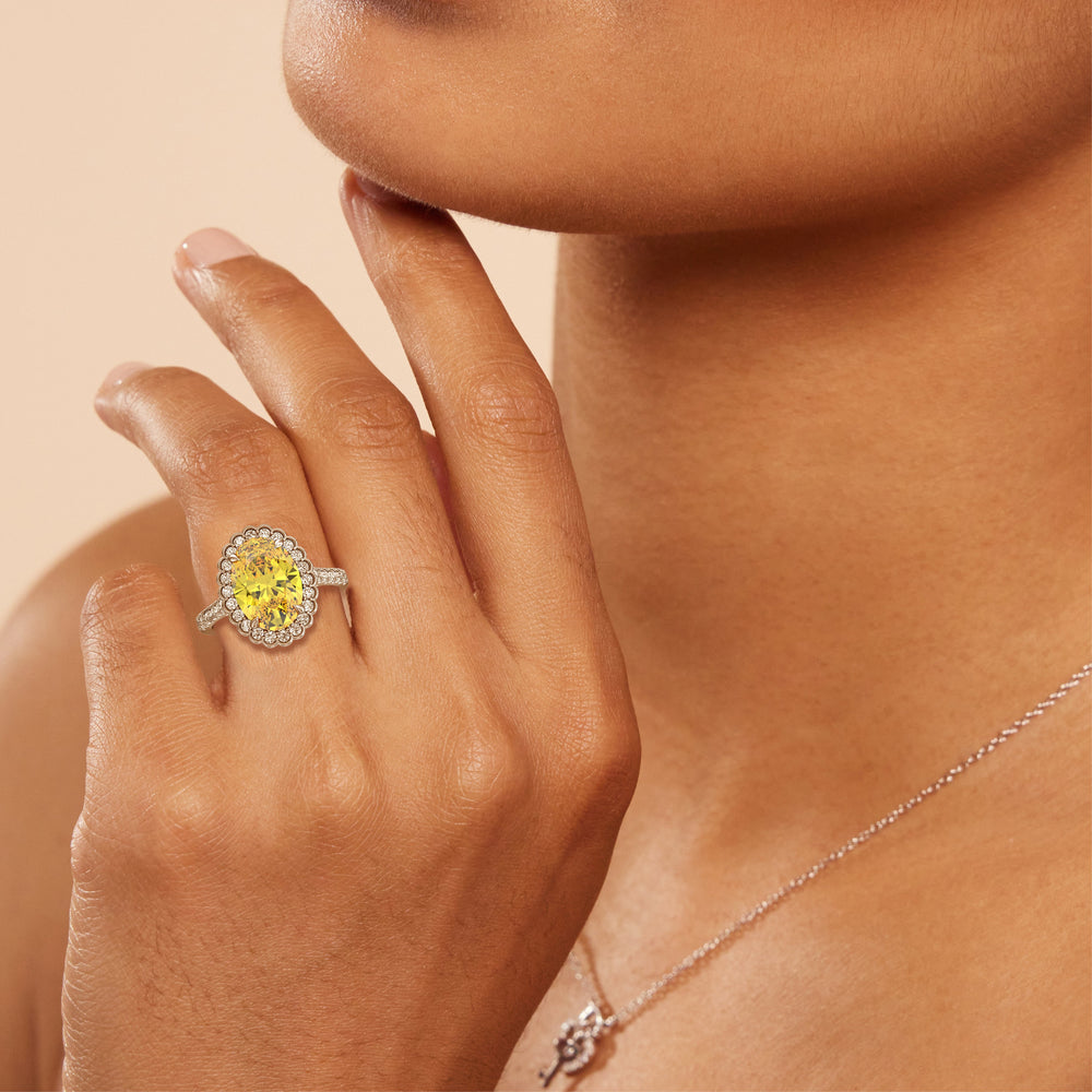 Model Wearing Fancy Intense Yellow Oval Halo Ring with Lab Grown Diamond view