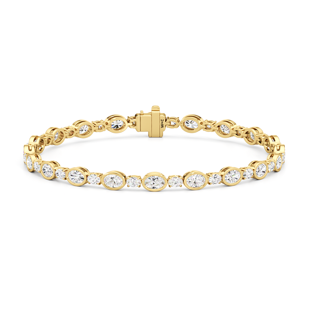 Bezel Oval Alternating Tennis Bracelet with 4 1/2 Cut Diamond in 14KT Yellow Gold view 1
