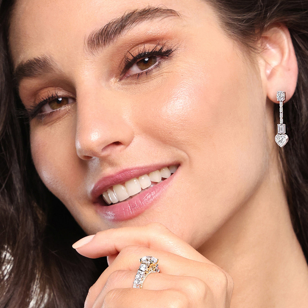 Model Wearing Heart Shape Dangler Earrings view