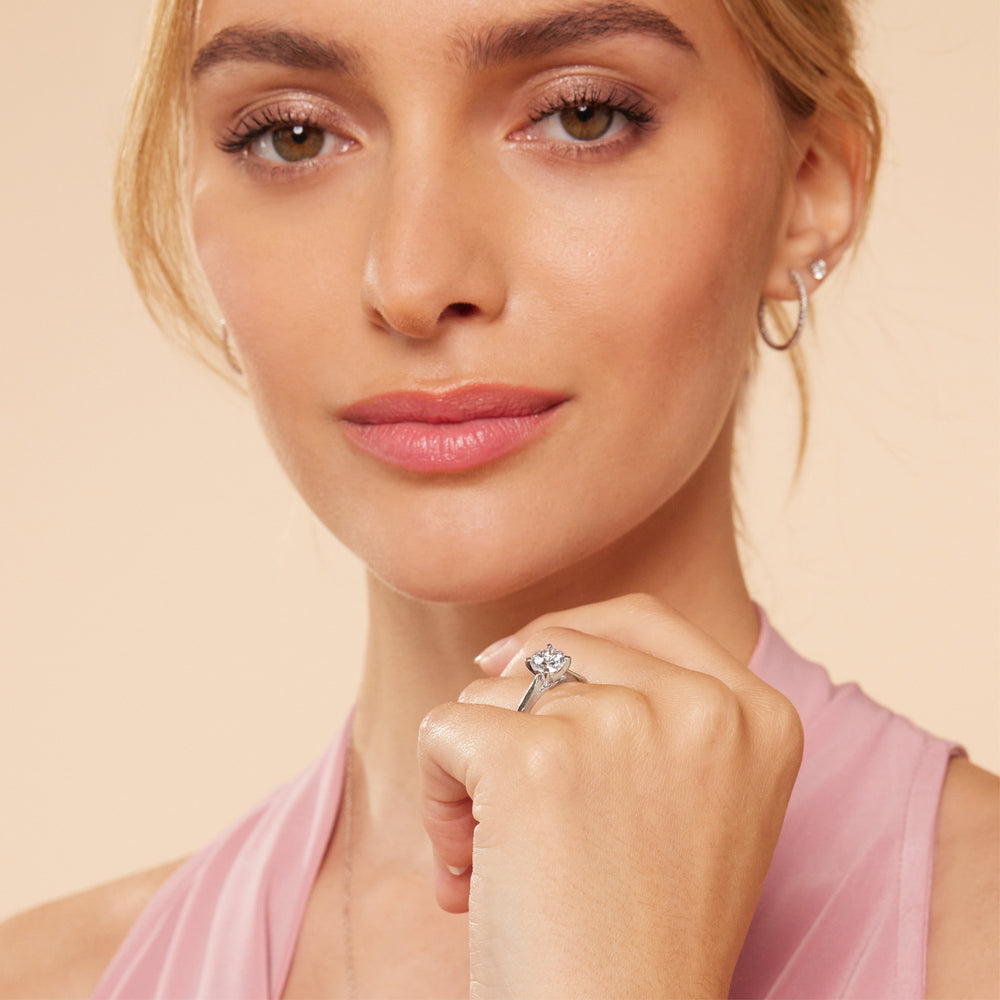 Model Wearing Medi Sleek Cathedral Solitaire Engagement Ring view