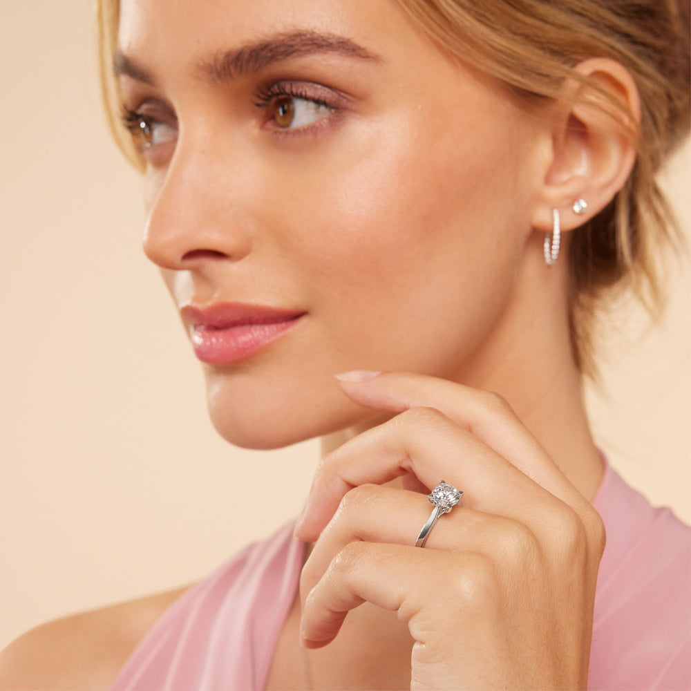Model Wearing Medi Sleek Cathedral Solitaire Engagement Ring view