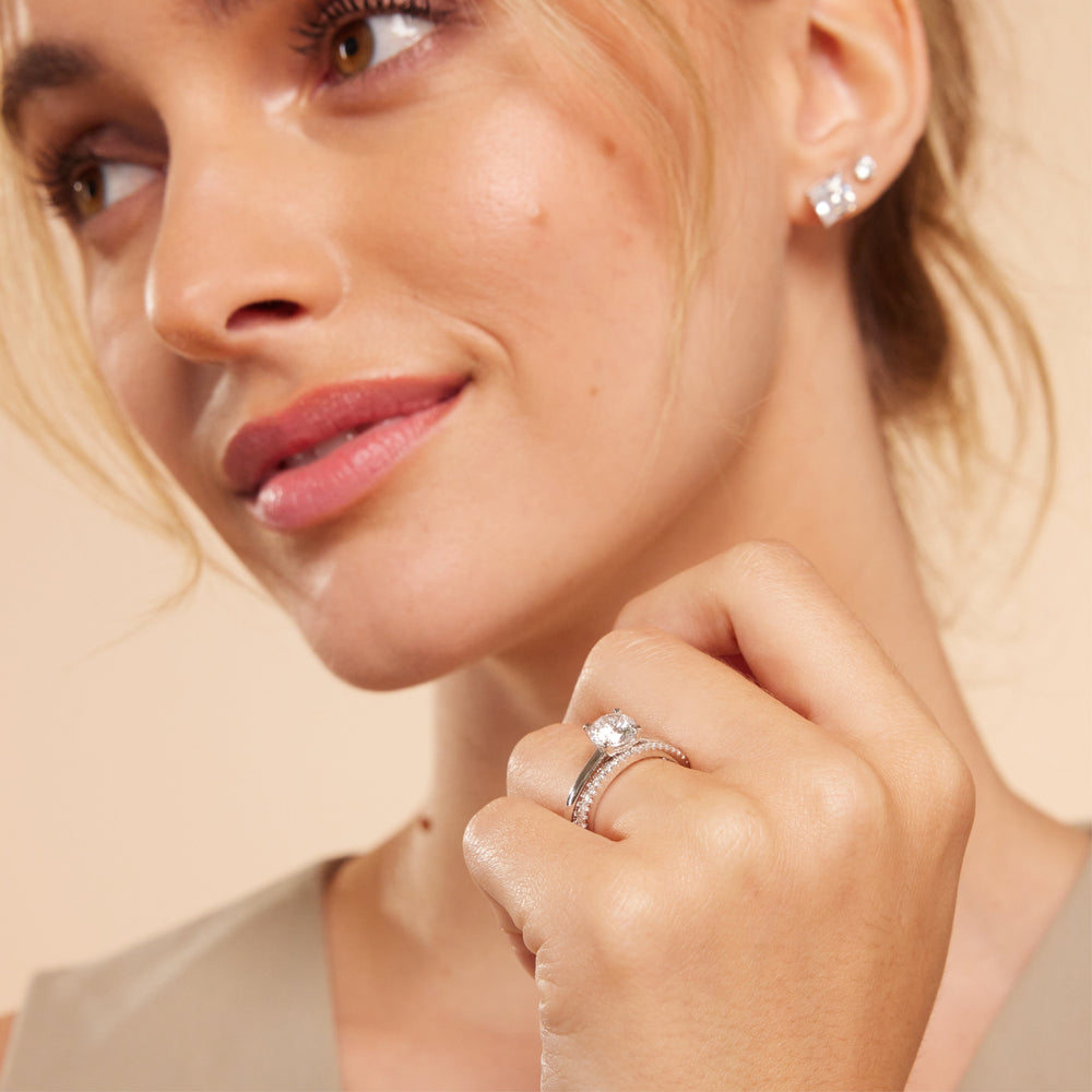 Model Wearing Aura Studded Crescent Shank Hidden Halo Solitaire Ring with Lab Grown Diamond view