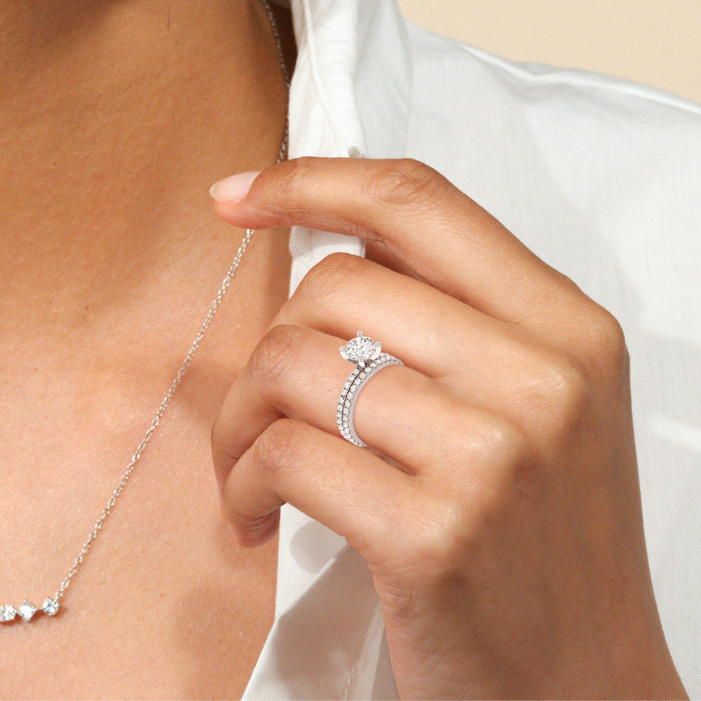 Model Wearing Ara Medi Traditional Pave Diamond Wedding Band view