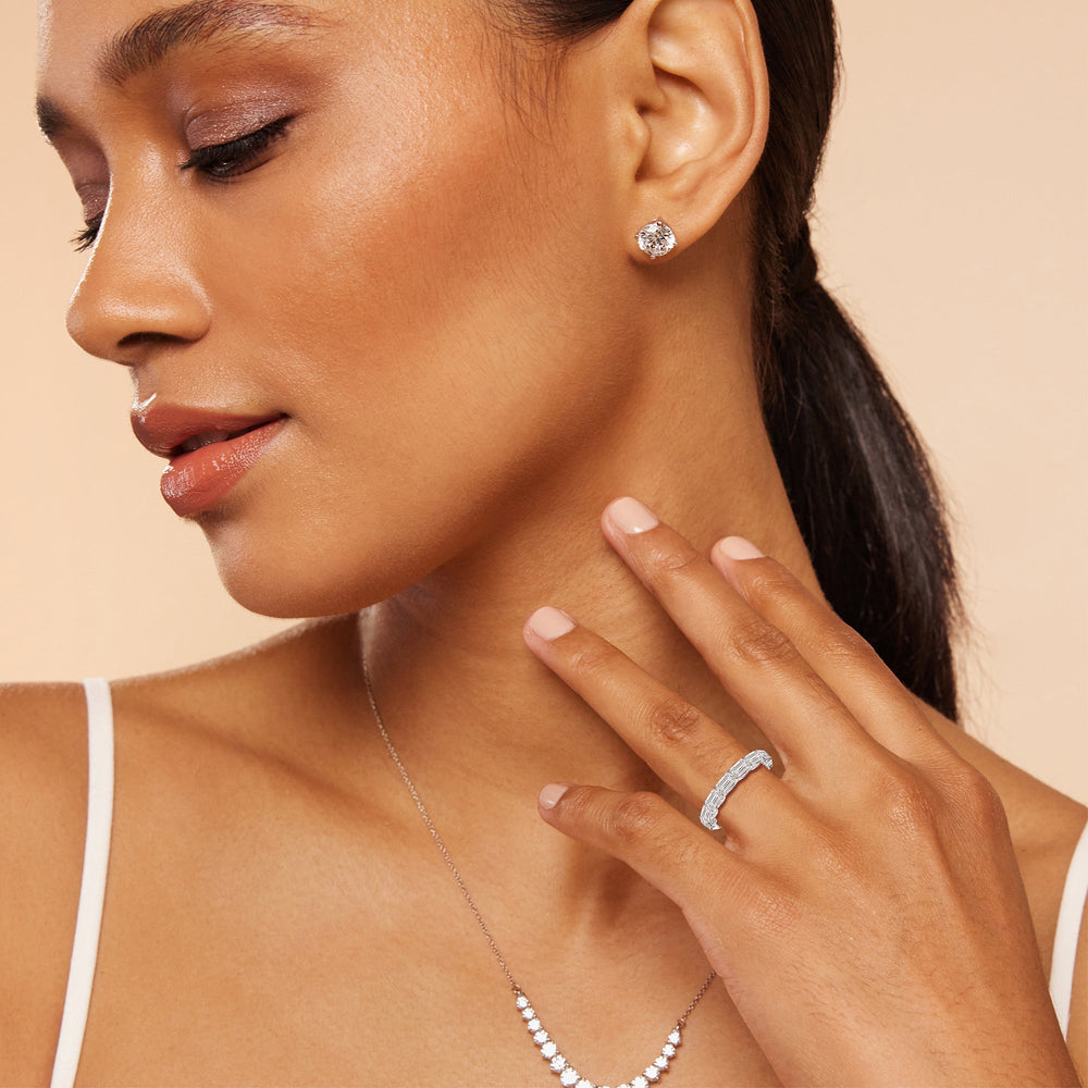 Model Wearing East-West Sash-Set Emerald Cut Diamond Eternity Ring view