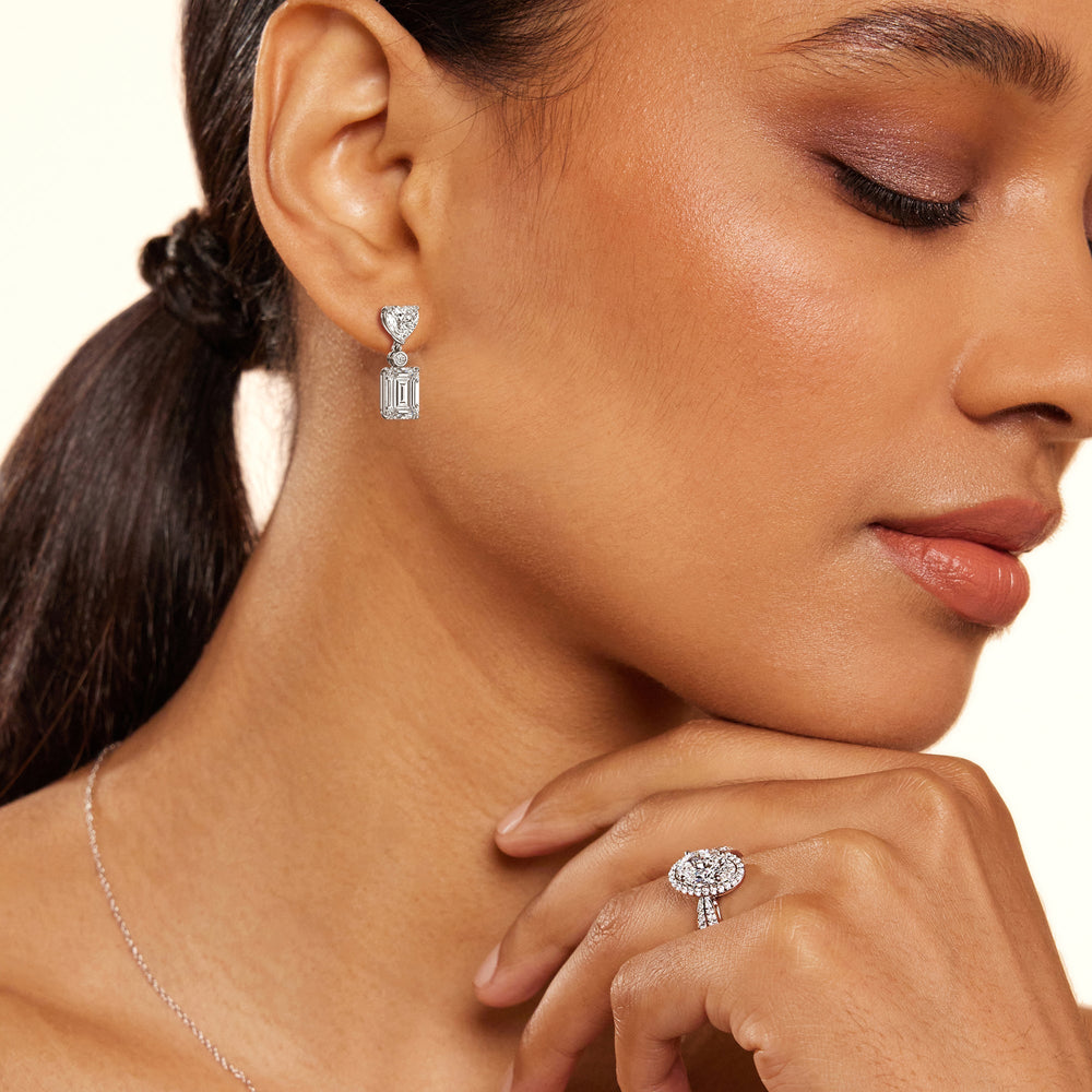 Model Wearing Heart Shape with Emerald Drop Earrings view