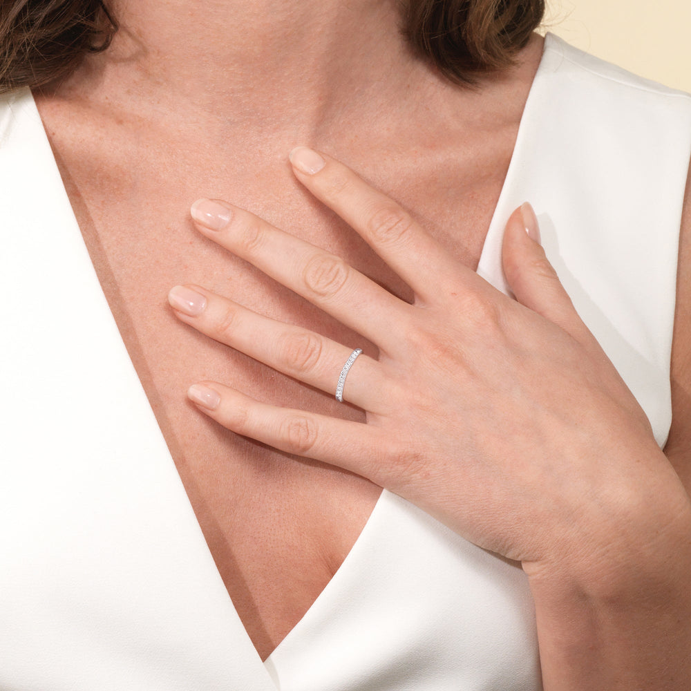 Model Wearing Lyra Medi Traditional Pave Diamond Wedding Band view