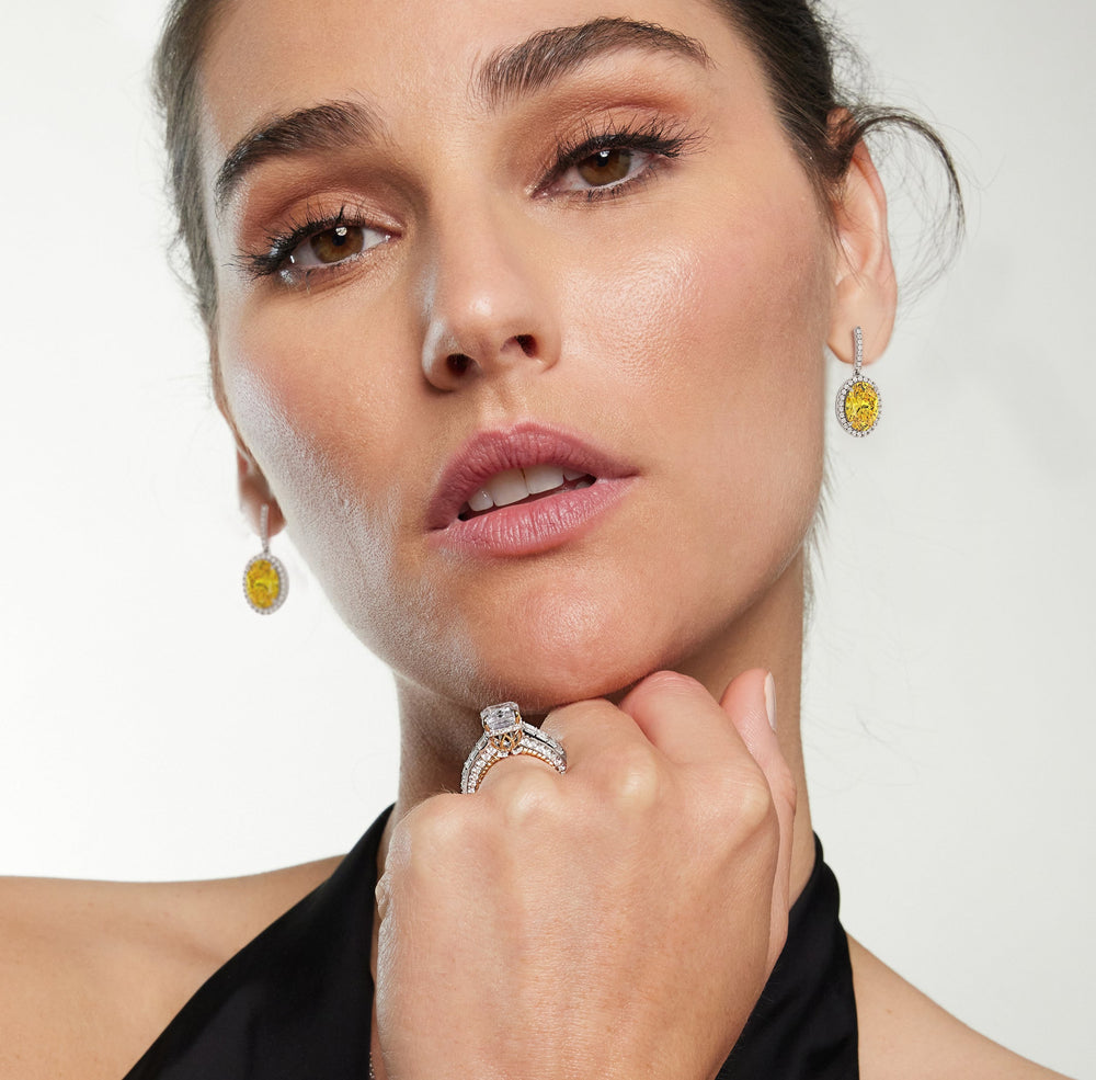 Model Wearing 8 Ct Pair Fancy Deep Yellow Halo Drop Earrings view