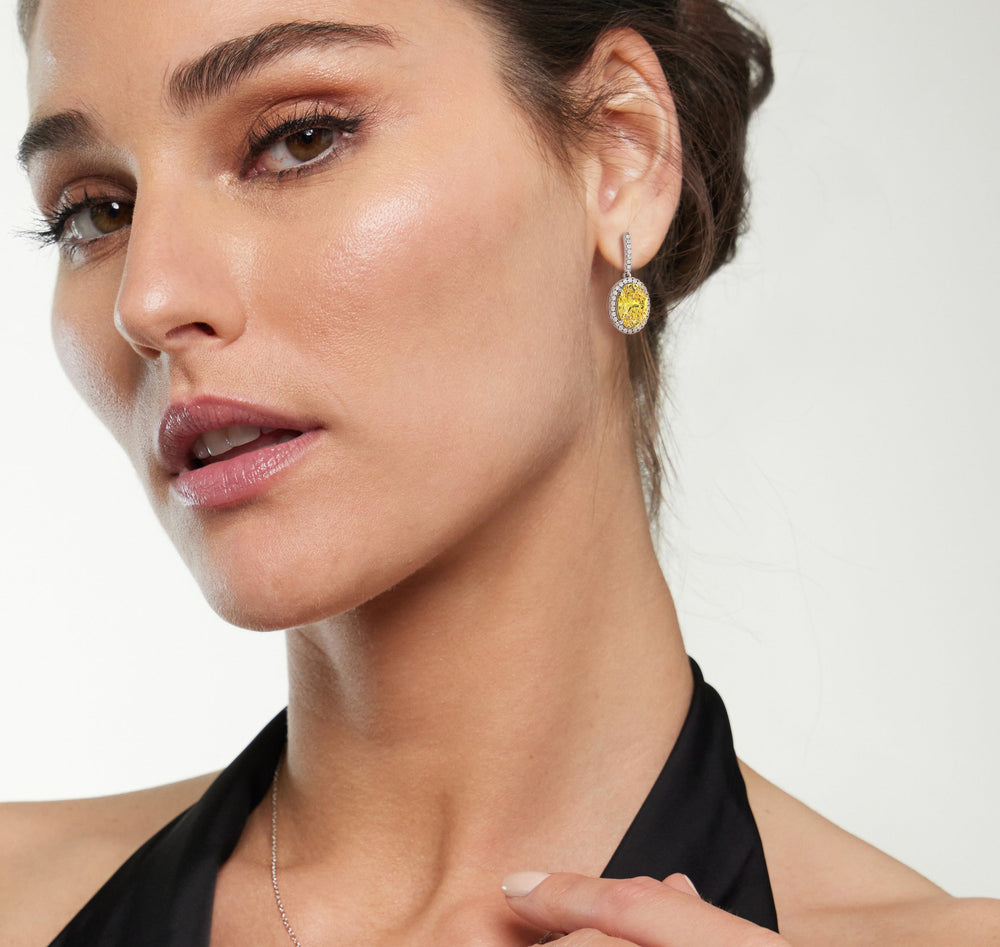 Model Wearing 8 Ct Pair Fancy Deep Yellow Halo Drop Earrings view
