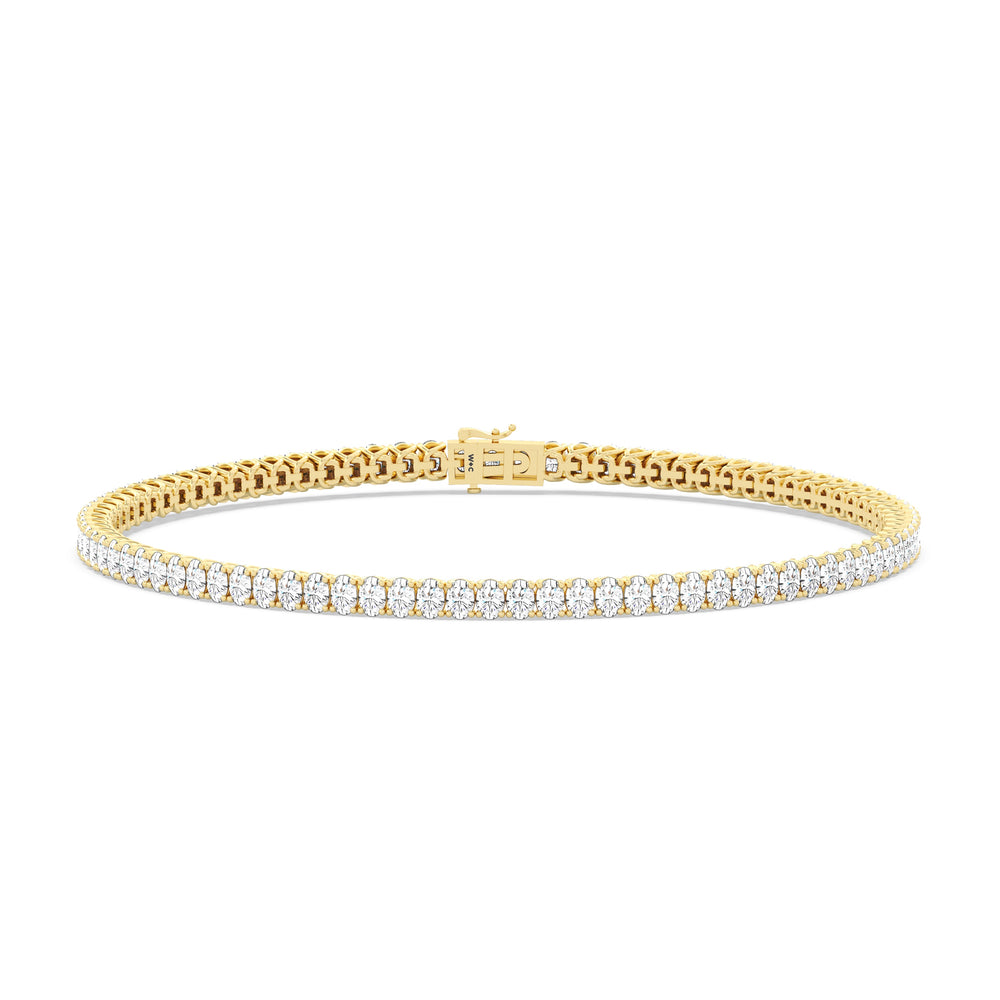 Oval Tennis Bracelet with 3 Cut Diamond in 14KT Yellow Gold view 1
