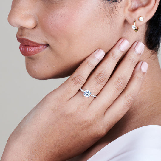 Model Wearing Under Bezeled Accent Diamond Engagement Ring view