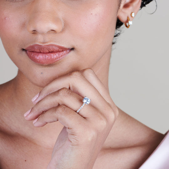 Model Wearing Under Bezeled Accent Diamond Engagement Ring view