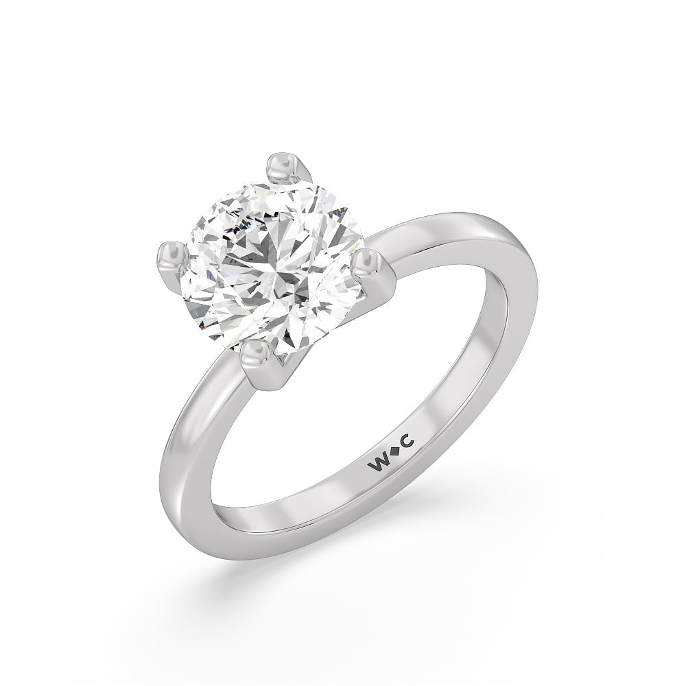 Petite Solitaire Diamond Engagement Ring with Round Cut Diamond in 14KT Platinum view 3
