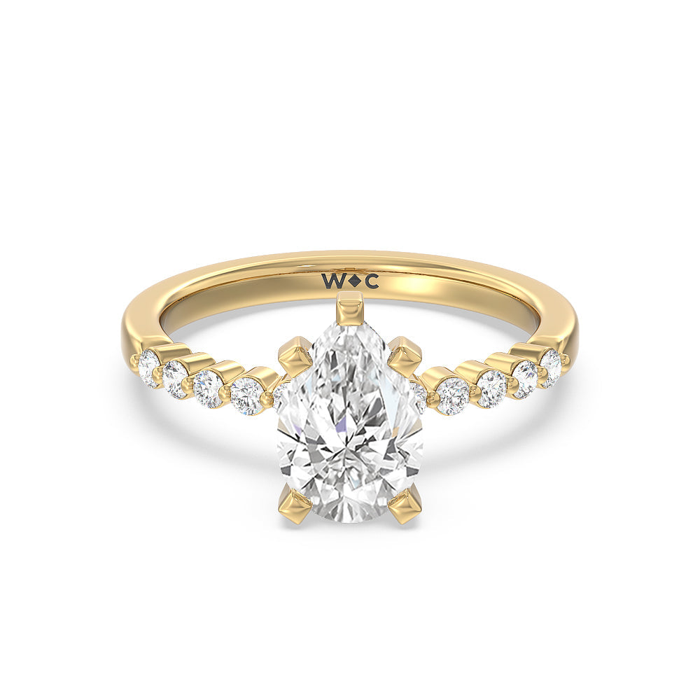 Under Bezeled Accent Diamond Engagement Ring with Pear Cut Diamond in 14KT Yellow Gold view 1
