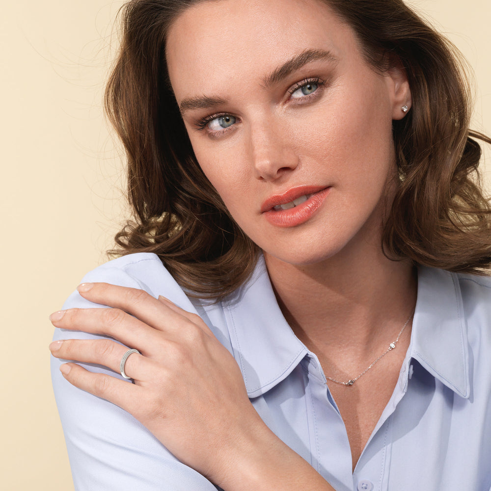 Model Wearing Knife Edge Diamond Hidden Halo Wedding Band view