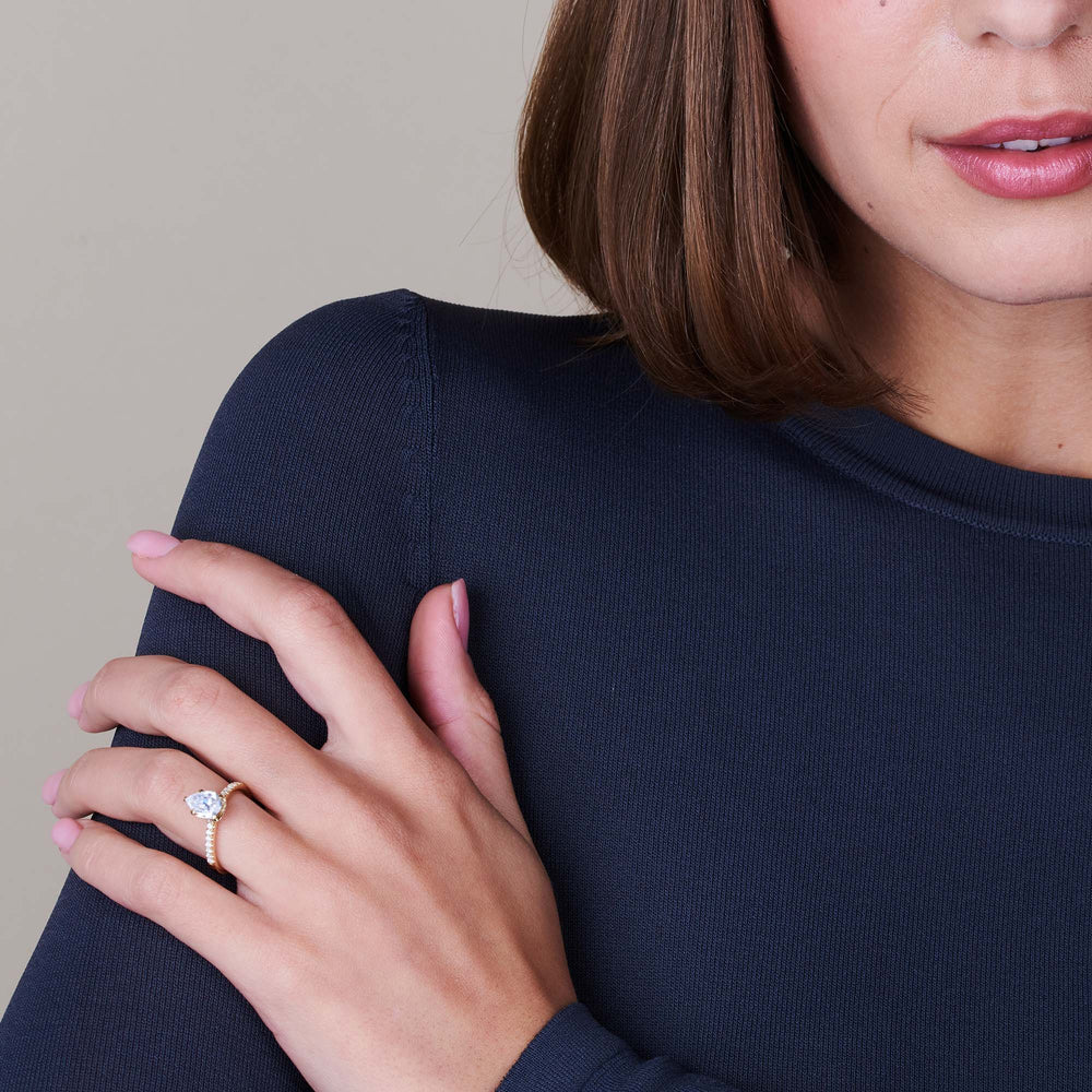 Model Wearing Ara Fine Hidden Halo Engagement Ring view