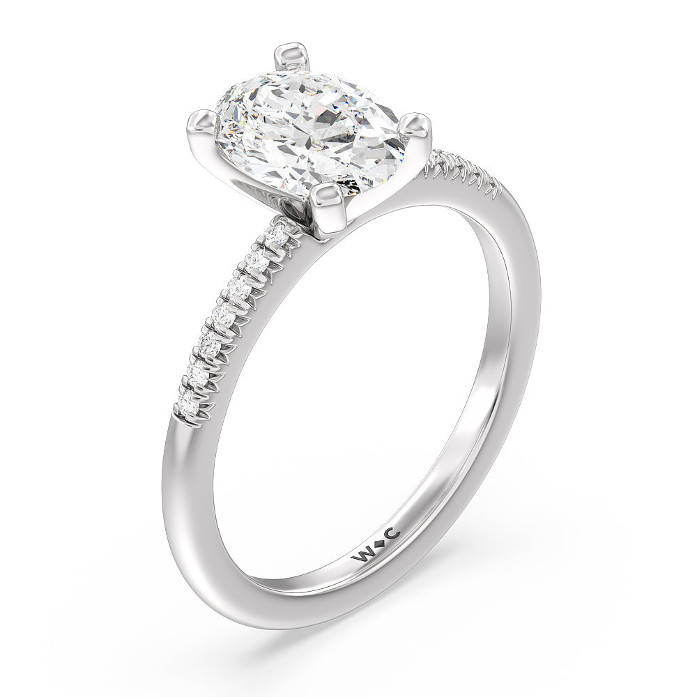 Lyra Petite French Set Diamond Engagement Ring with Oval Cut Diamond in 14KT Platinum view 3
