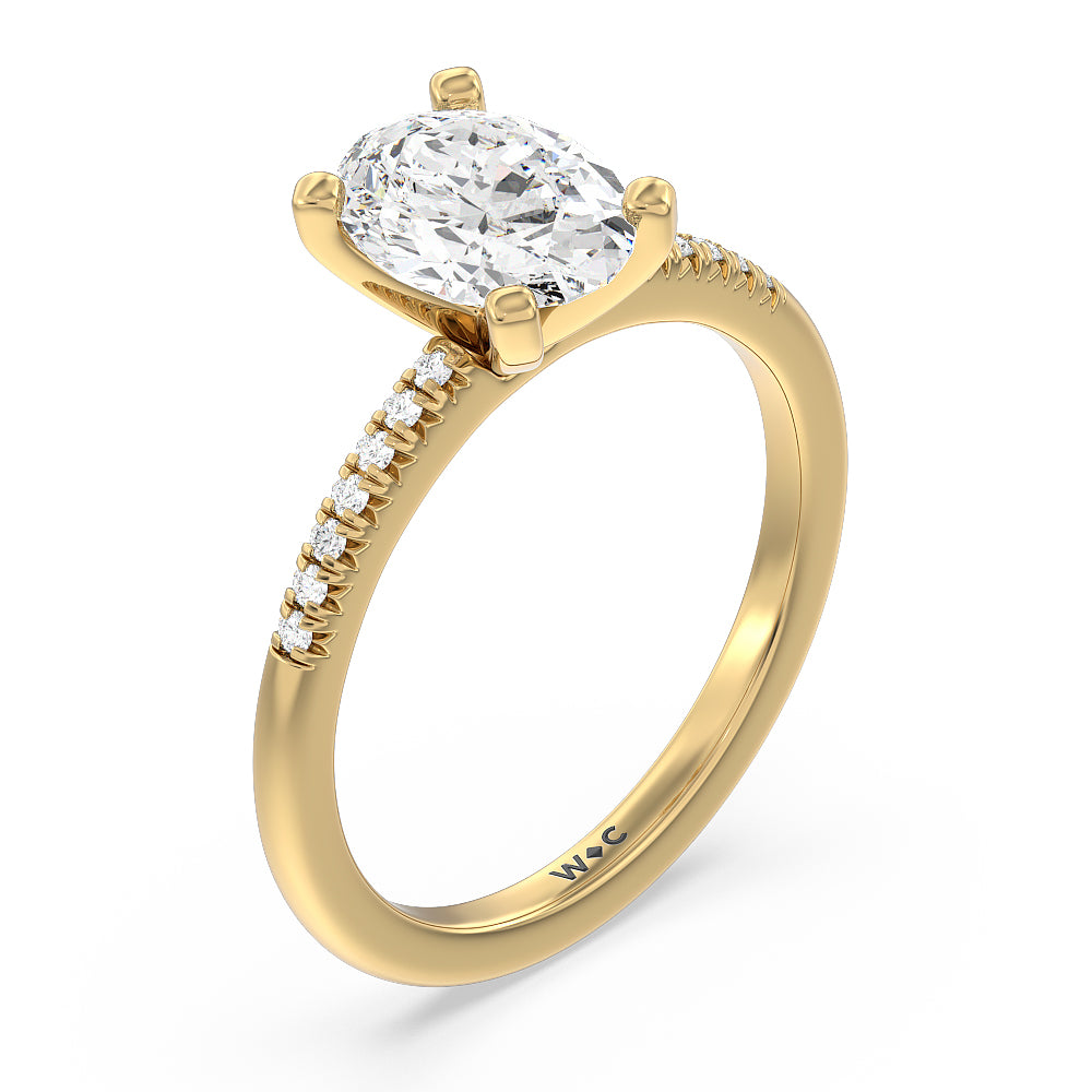 Lyra Petite French Set Diamond Engagement Ring with Oval Cut Diamond in 14KT Yellow Gold view 3

