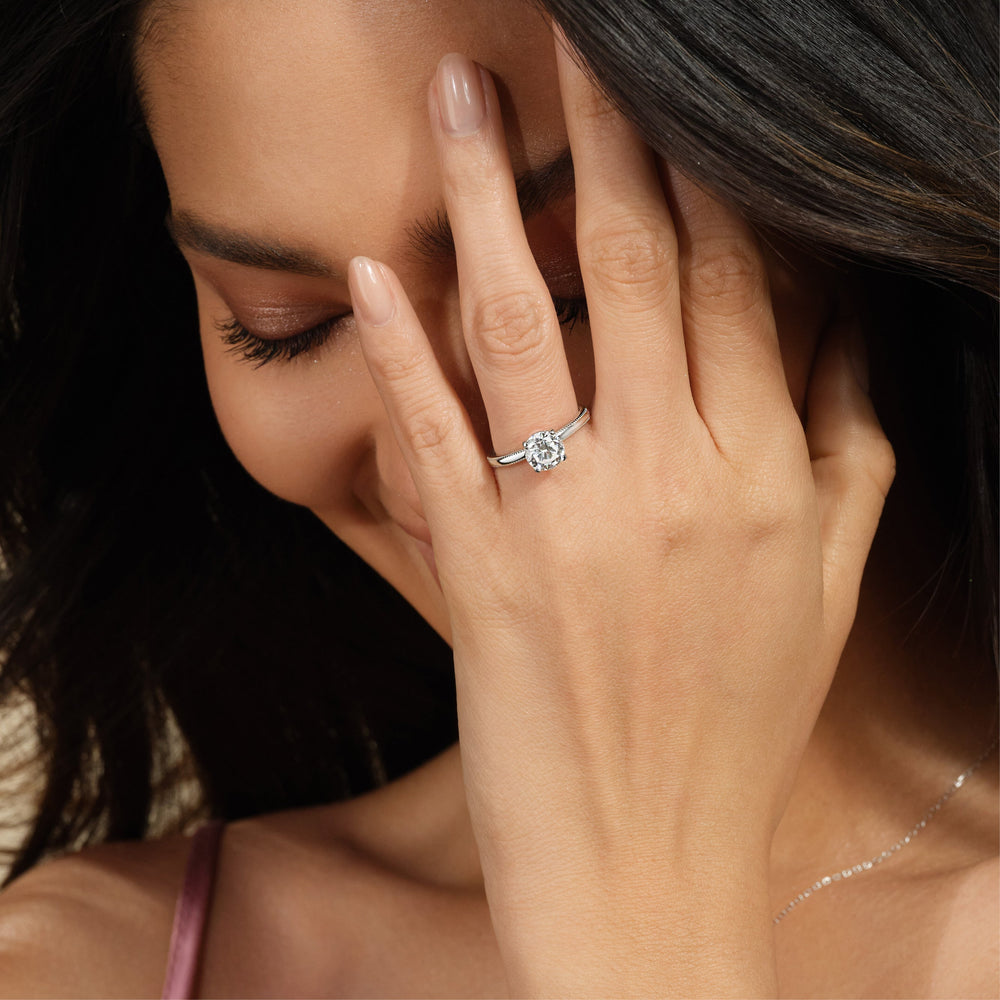 Model Wearing Kite Basket Four Prong Solitaire Engagement Ring view