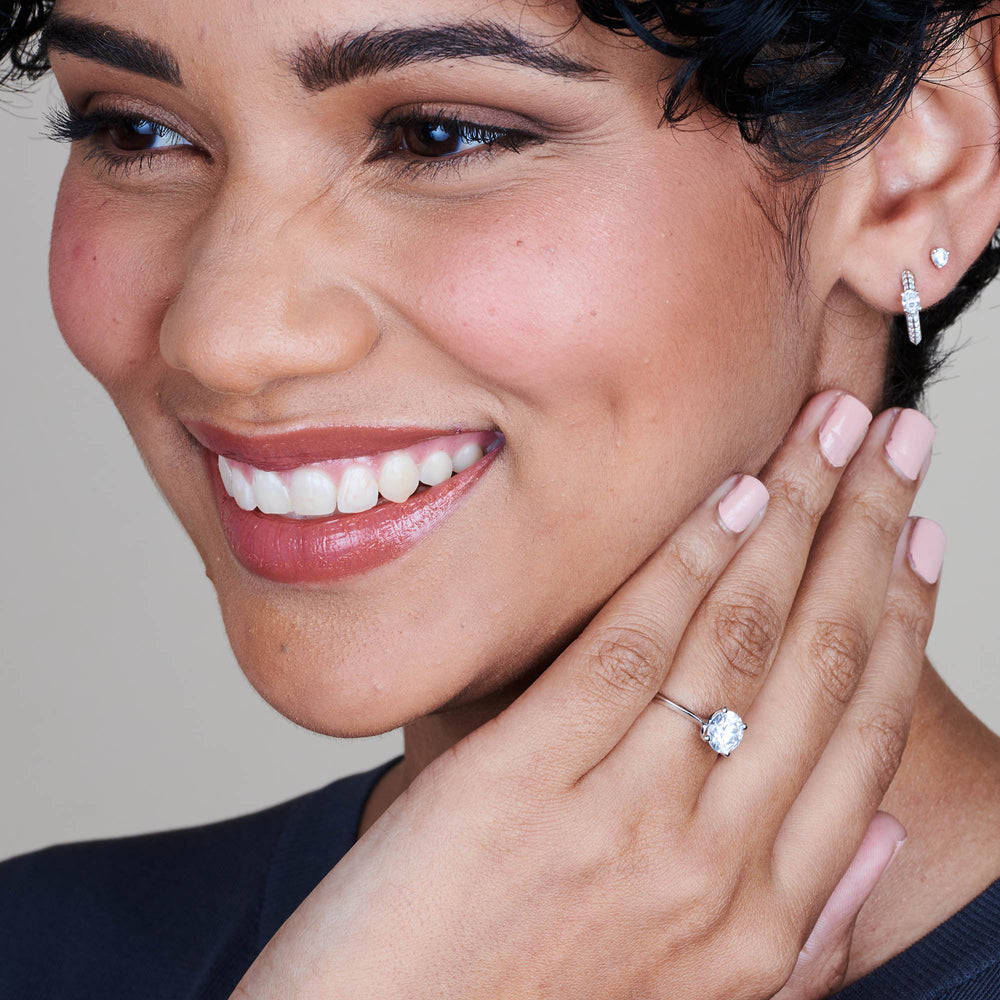 Model Wearing Knife Edge Solitaire Diamond Engagement Ring view
