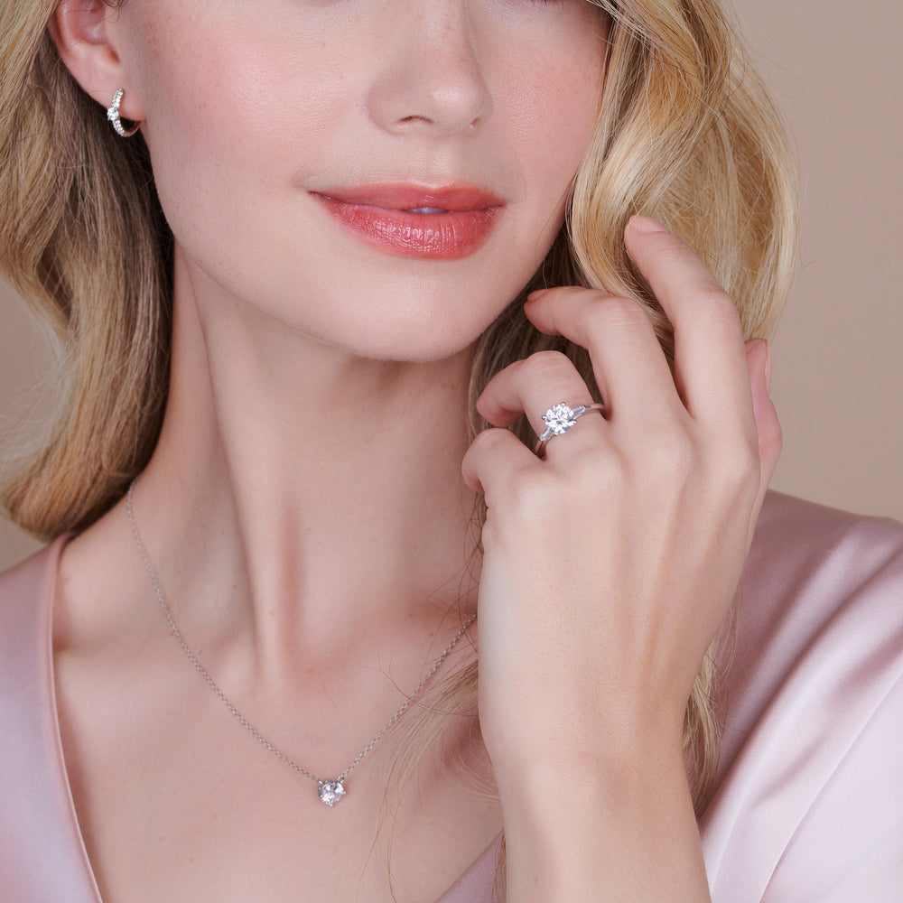 Model Wearing Three Stone Baguette Engagement Ring view