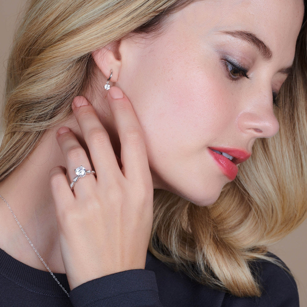 Model Wearing Petal Hidden Halo Engagement Ring with Lab Grown Diamond view