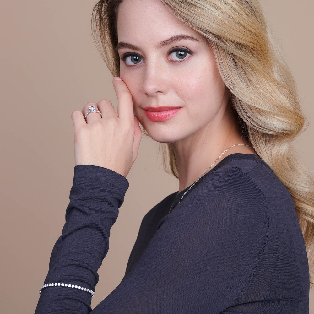 Model Wearing Modern Pave Diamond Hidden Halo Ring view