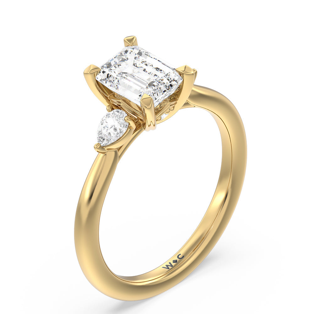 Fine Line Pear Three Stone Engagement Ring with Emerald Cut Diamond in 14KT Yellow Gold view 3
