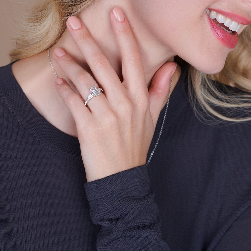 Model Wearing Three Stone Tapered Baguette Diamond Engagement Ring view