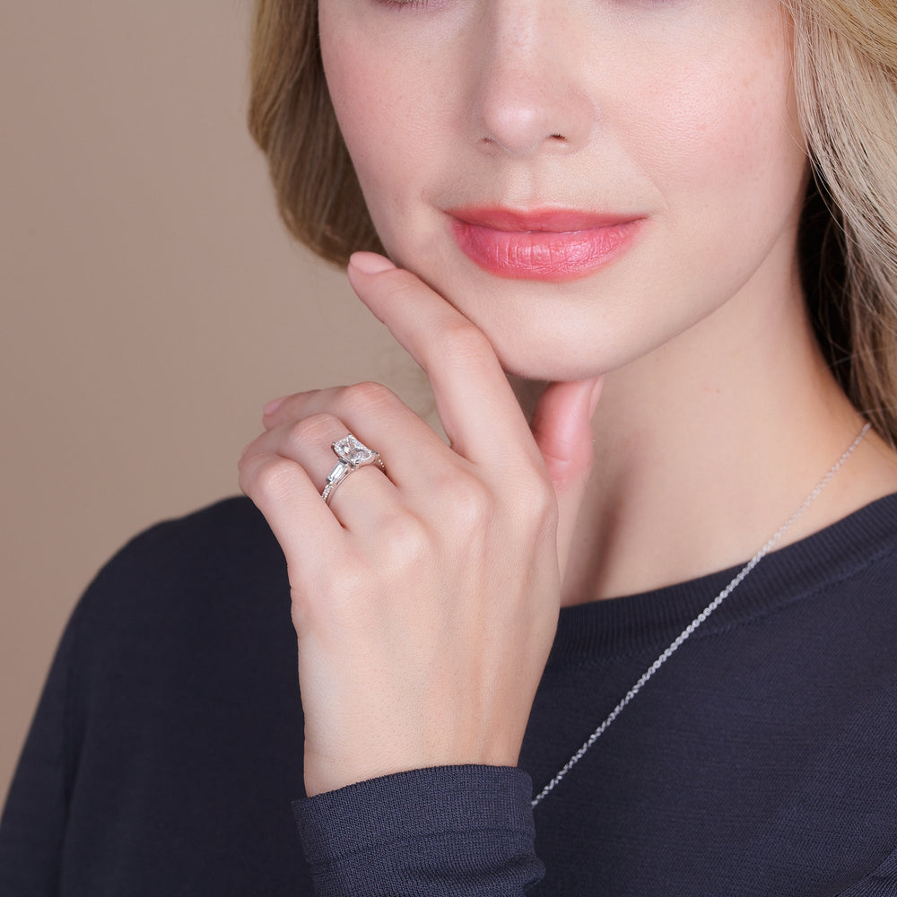 Model Wearing Three Stone Tapered Baguette Diamond Engagement Ring view