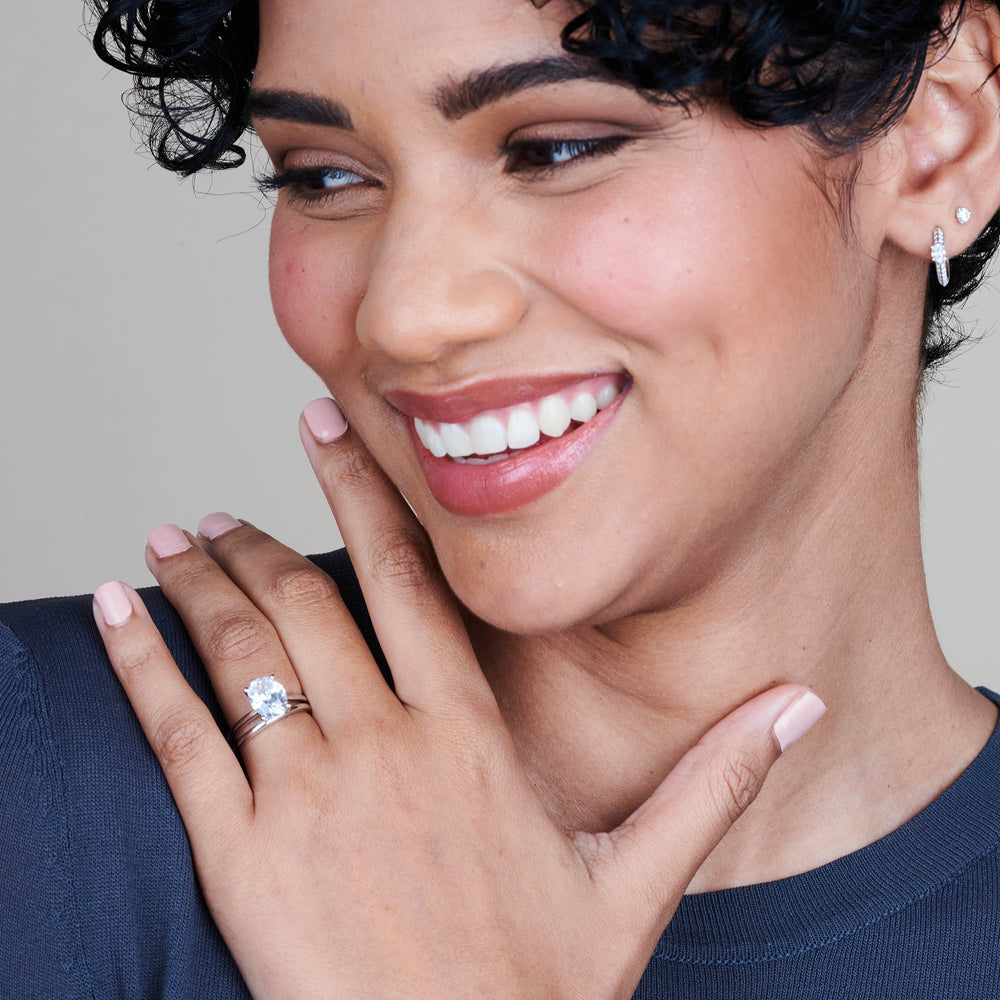Model Wearing Noveau Four Prong Solitaire Engagement Ring view