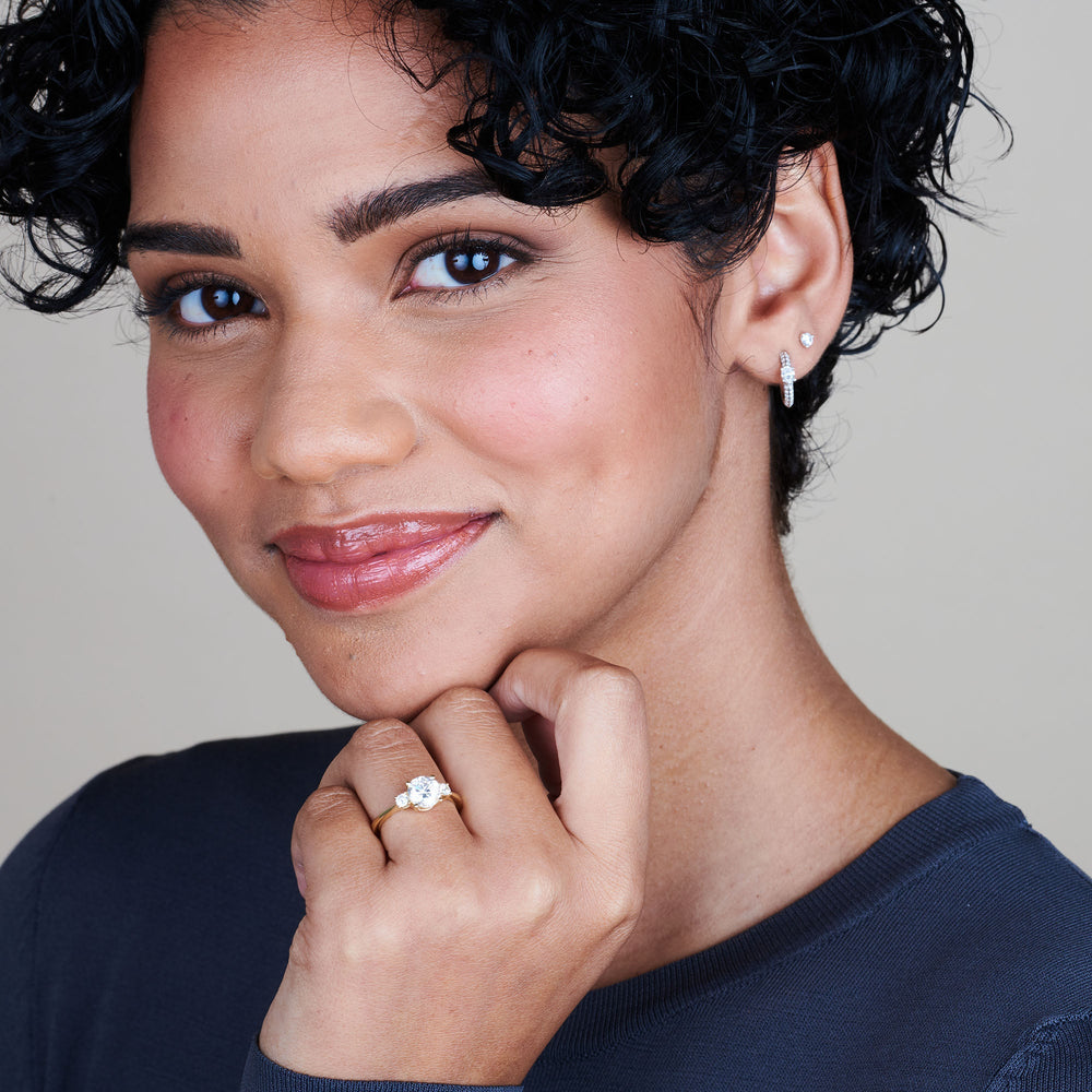 Model Wearing Petite Three Stone Diamond Engagement Ring view