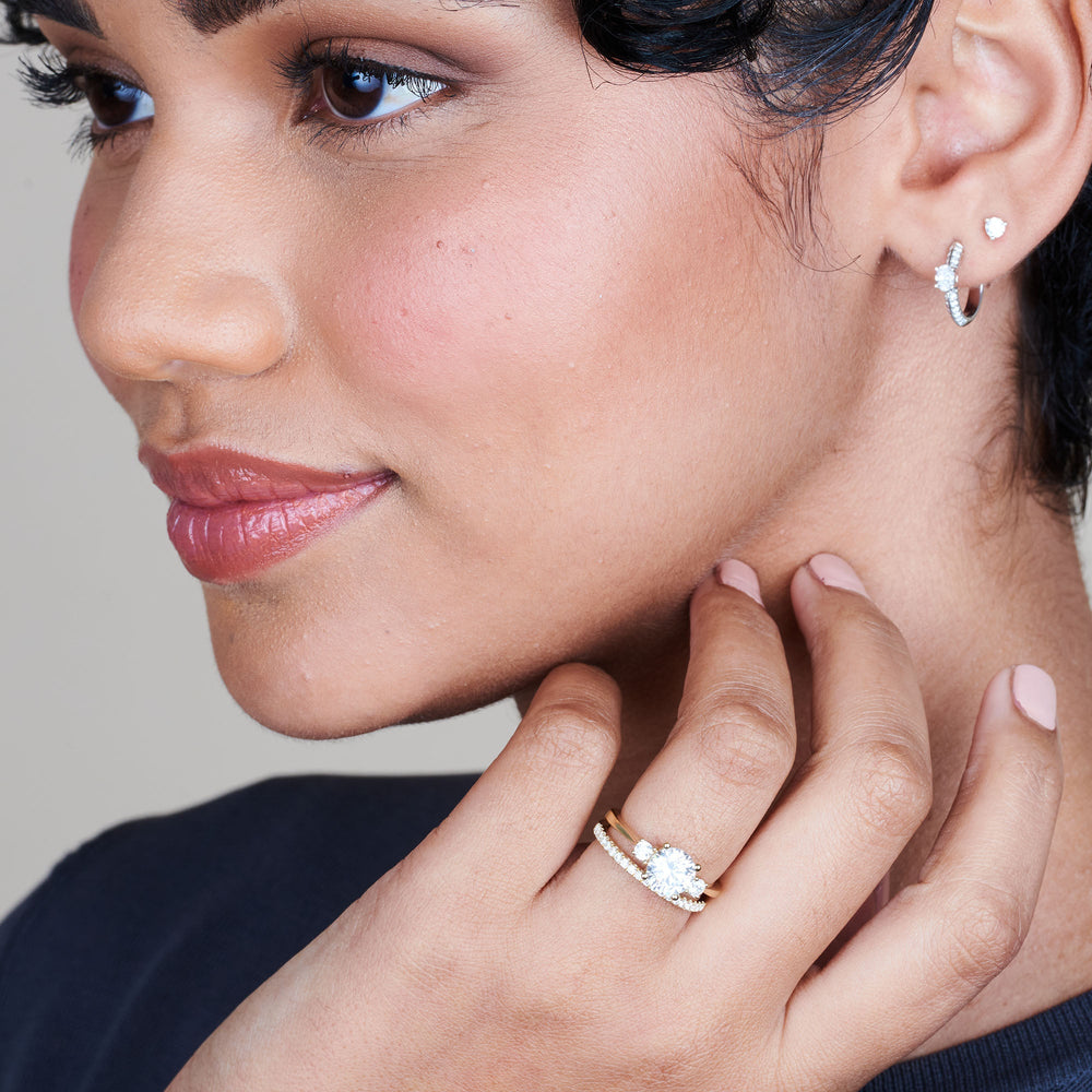 Model Wearing Petite Three Stone Diamond Engagement Ring view