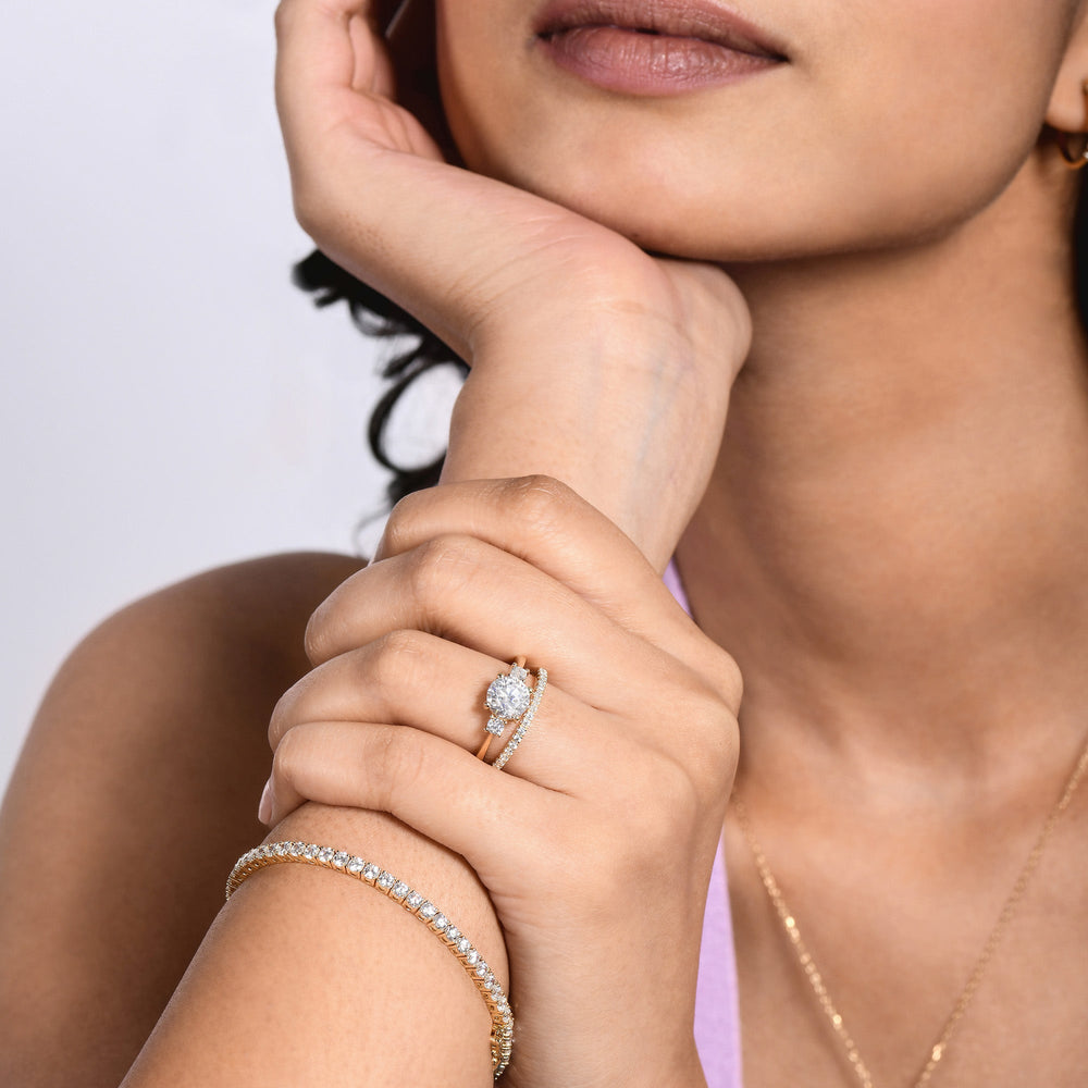 Model Wearing Petite Three Stone Diamond Engagement Ring view